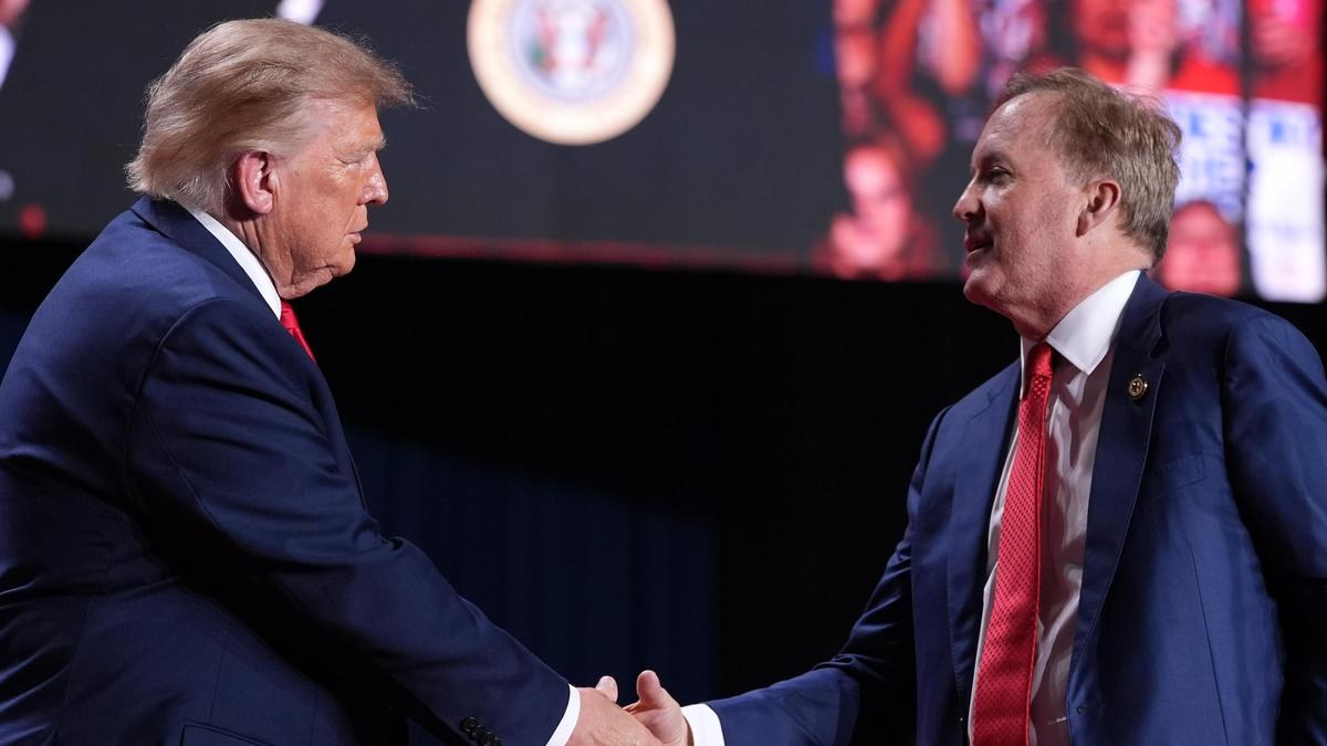 Trump Faces Protesters While Rallying Texas Voters Behind Paxton